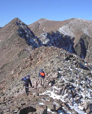 Laurie Loshaek and George Kasynski embarking on the east ridge's curvaceous culmination on 10/12/03
