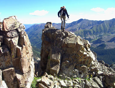 Jennifer Roach on the approach to the southeast ridge of Precarious Peak