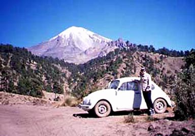 Our rent-a-bug at 12,600 feet on Sierra Negra with Orizaba's southern slopes beyond