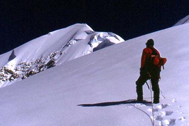 Gerry leading toward the still distant summit