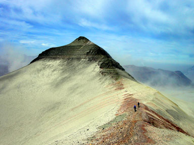 From the false summit 'Half Baked,' the summit of Baked juts up above the dust storm below