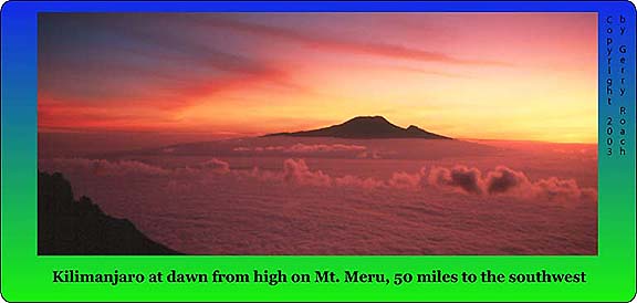 Photo of Kilimanjaro at dawn from high on Mount Meru, fifty miles to the southwest