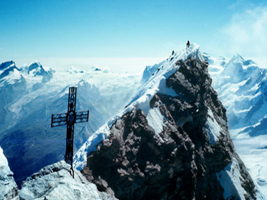 The main summit of the Matterhorn from the slightly lower Italian summit